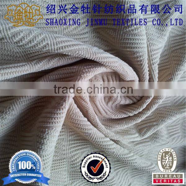 Solid jacquard knitting fabric
