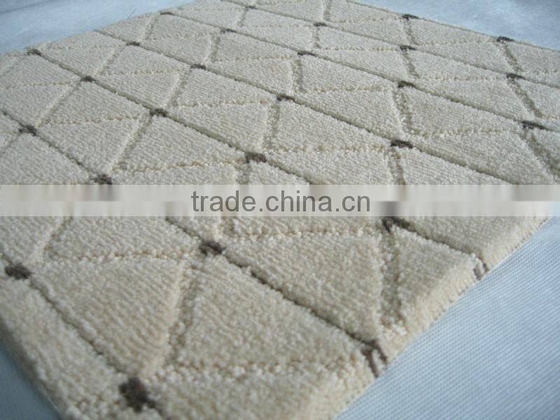 Nylon machine made wall to wall carpet with action backing