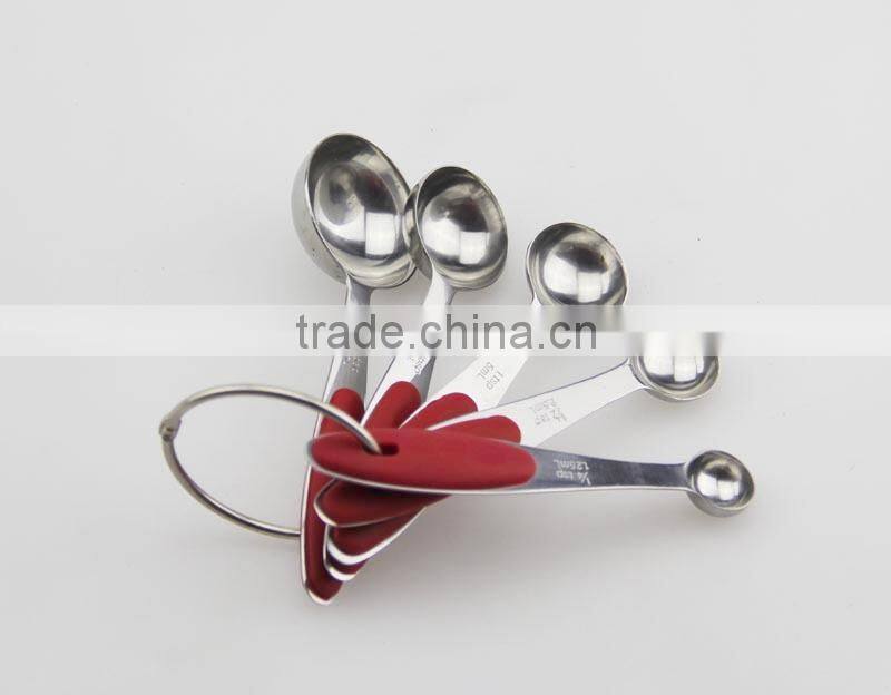 Measure spoon with silicone handle