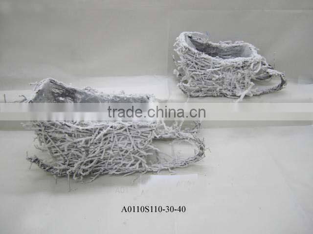 indoor rattan boot planter with snow
