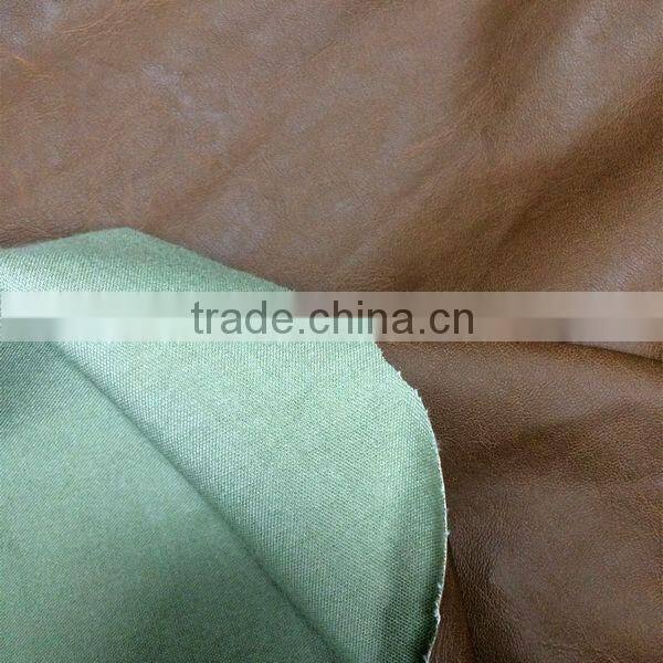 Soft hand-feeling PU faux leather fabric for clothing usage with rayon backing