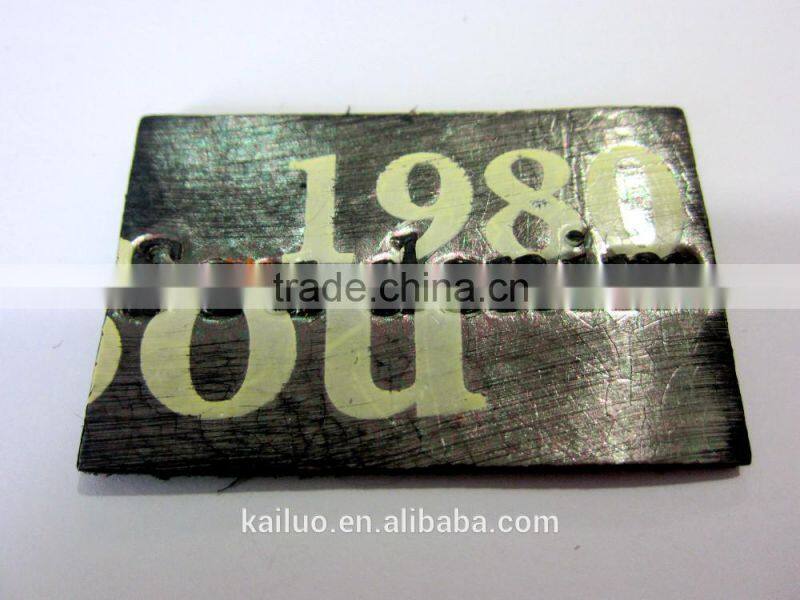 Embossed logo leather label for jeans