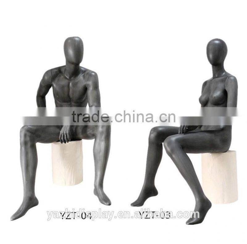 Abstract sexy headless female sitting mannequin for window display