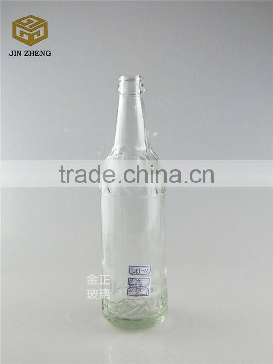 330ml dark amber open beer bottle with fridge magnet