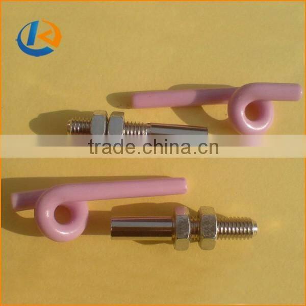 Slotted textile ceramic eyelet for wire guiding