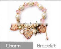 White And Champagne Crystals Acrylic Bowknow Bracelet