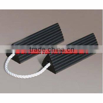 Automotive Wheel Chock with Pull Rope attached.