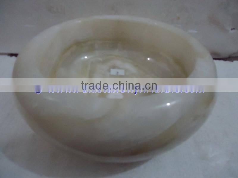 The most beautiful& best quality PURE WHITE ONYX ROUND TYRE SHAPED SINKS AND BASINS