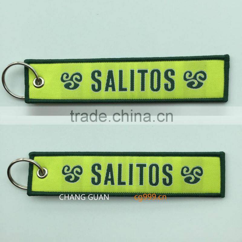 The bottle opener woven label bag charms