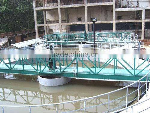 Sludge treatment bridge type sludge scraper