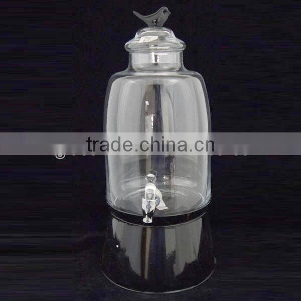 country style clear round juice dispenser with white metal ice bucket