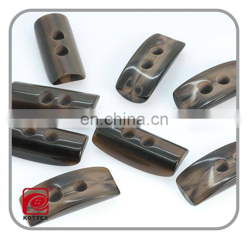special shaped smooth surface resin imitation horn toggle buttons,2014 plastic toggle button,garment accessories