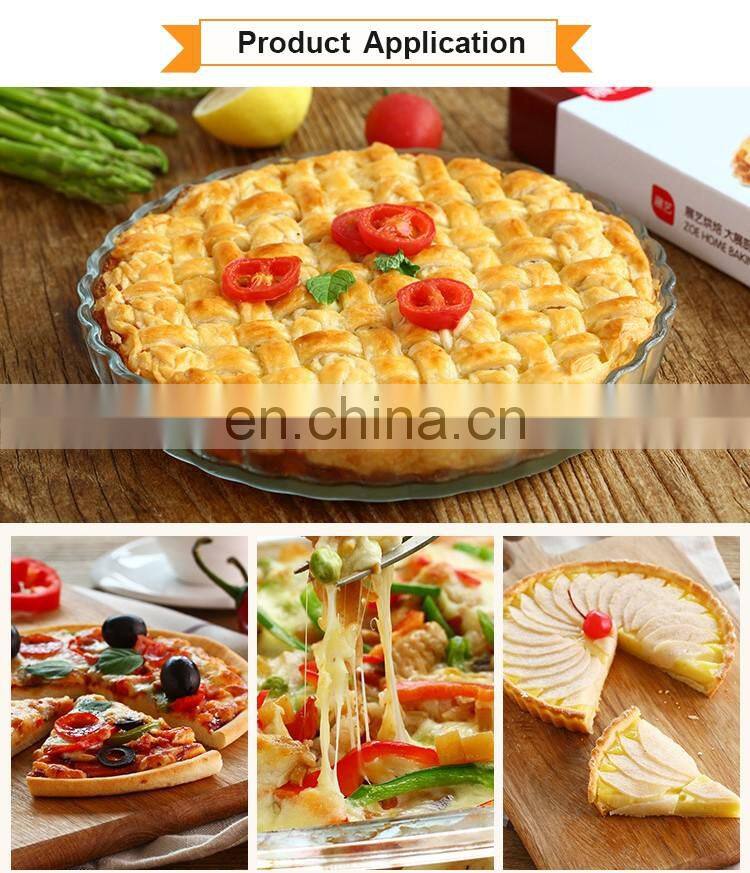 A Round Of Heat Resistant Glass Pizza Baking Dish