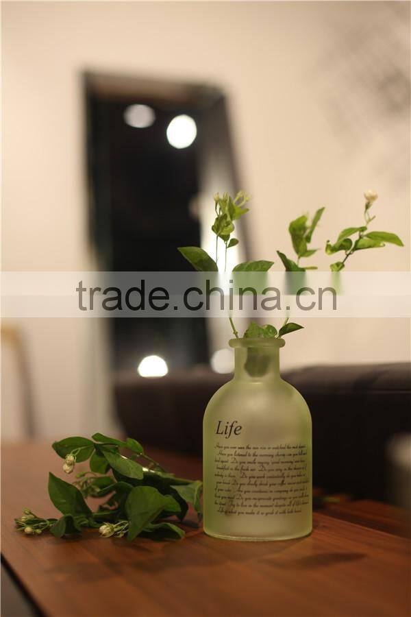 Lovely small round colored glass flower vase for living room