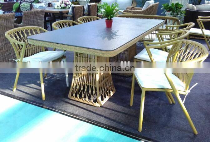 4 Person Plastic Rattan Peacock Dining Table and Chair with Cushion