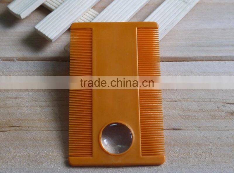 tick comb with magnifier