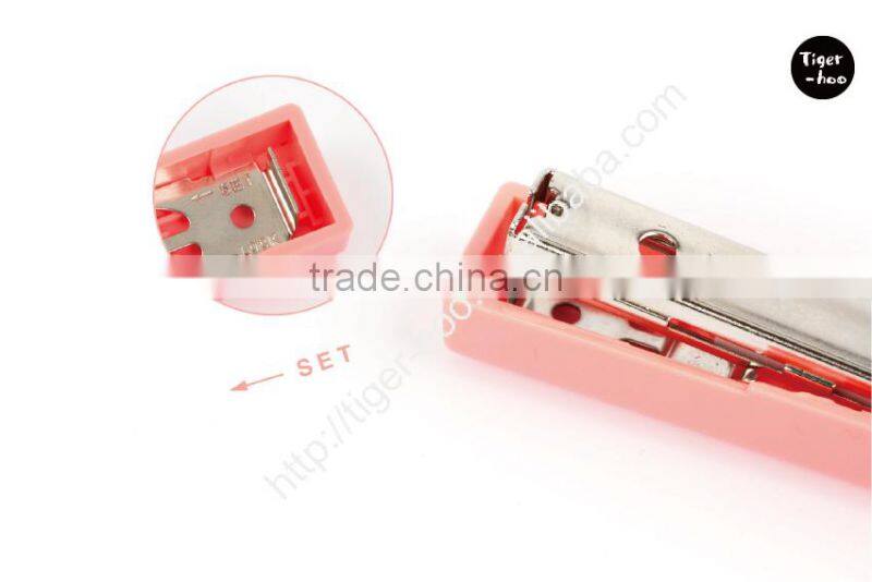 Handy mini stapler uses No. 10 Mini Staples refill