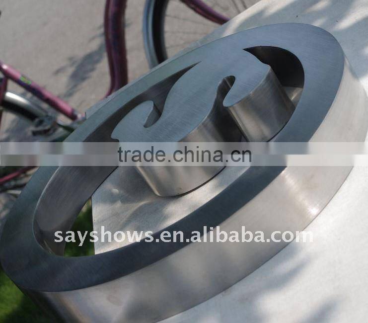 Laser cut seamless weld stainless steel logo