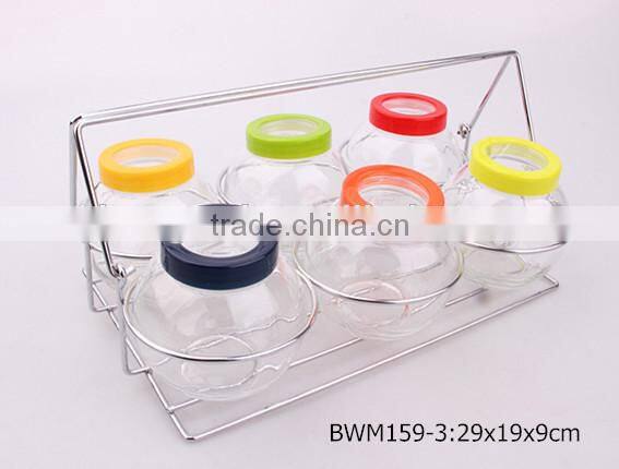 6pcs round glass jar set with plastic lid in a silver rack