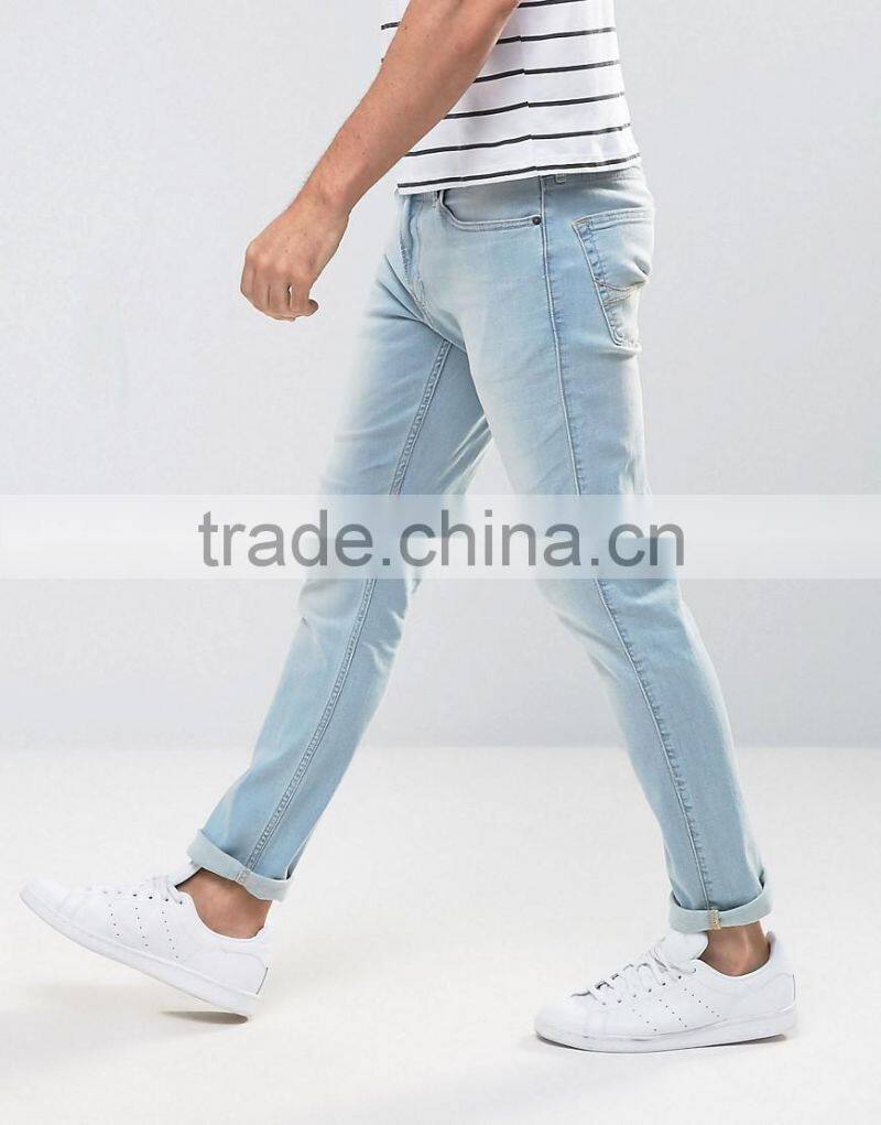 New Fashion Stretch Slim Jeans With Rips In Mid Wash for man