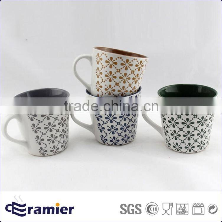 Stoneware conical shaped matte finished cups with handpainted flowers