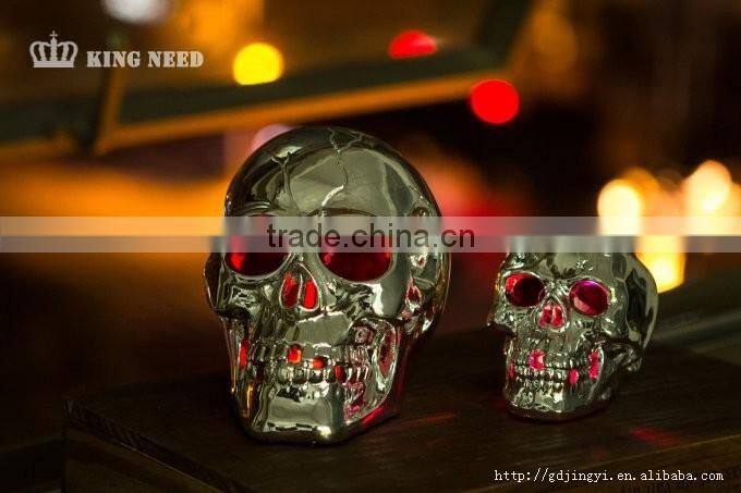 Silver plastic halloween skull head with LED light