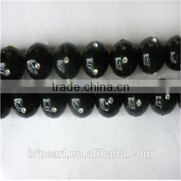 Best Price of 14mm Black Shell Pearls Beads with 4 Crystal Beads for Sale