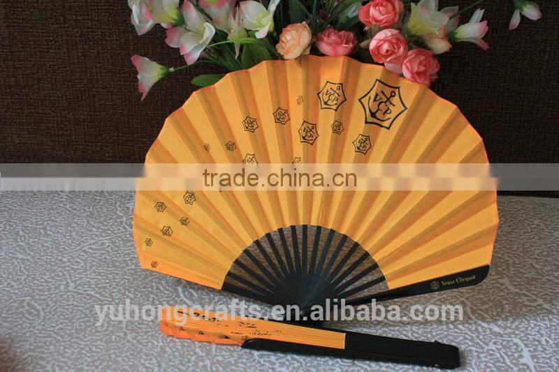 Chinese folding hand fan with black bamboo ribs