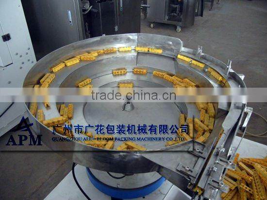 Mixed products filling and sealing packaging machine system