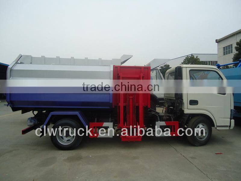Low Price Dongfeng 5000L hydraulic lifter garbage truck
