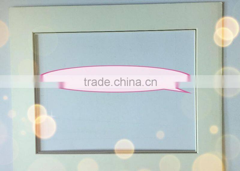 silver color photo frame matboard
