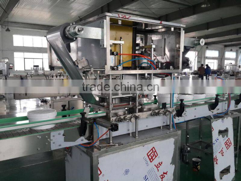 GMP standard automatic bottle filling machine