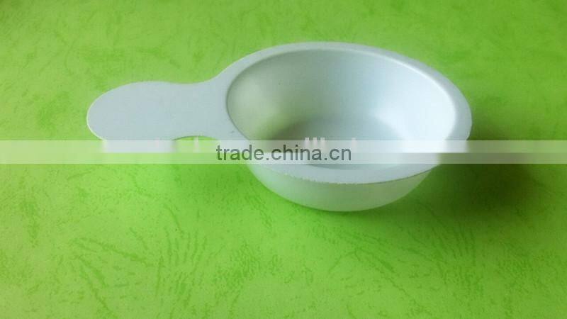 white disposable plastic tray for urine testing.