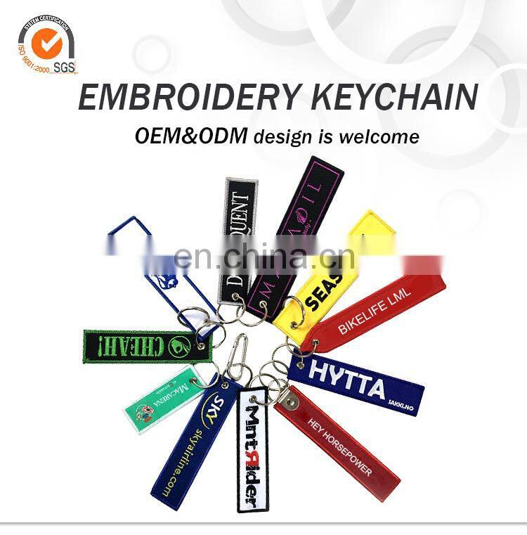 OEM keychain design, bulk cheap custom embroidery key ring with logo, airport fabric keychain for promotion