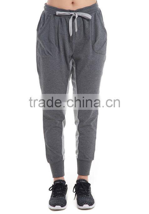 Women deep flowers grey trousers