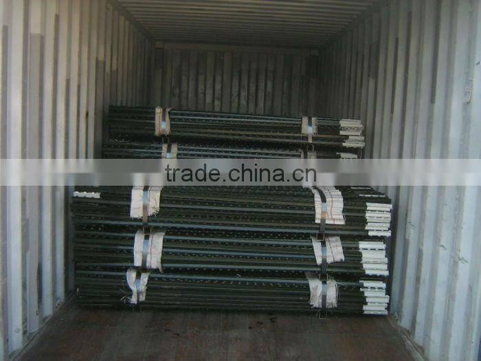 green painted farm fencing used t bar fence post