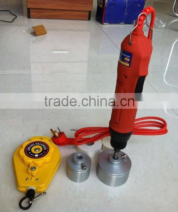 Electric hand-held screw capper