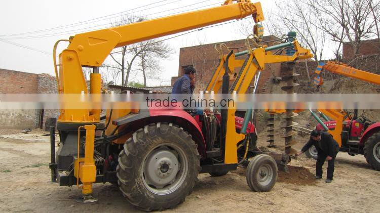 Tractor mounted crane with drilling rig for pole hole drilling