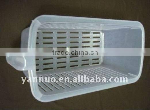 Plastic storage container rack in refrigerator