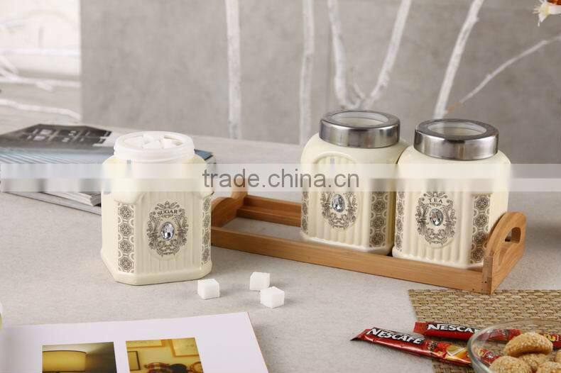 square ceramic canister set with bamboo stand
