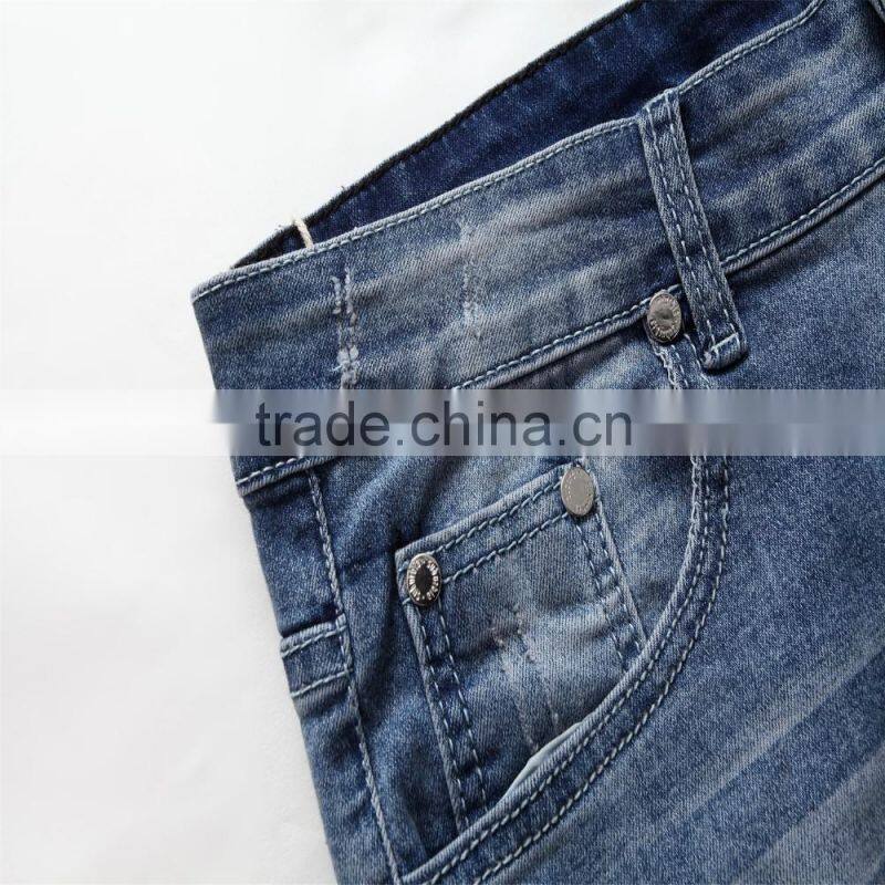 The new men's fashion men's jeans brand jeans hole personality male personality Slim comfortable pants