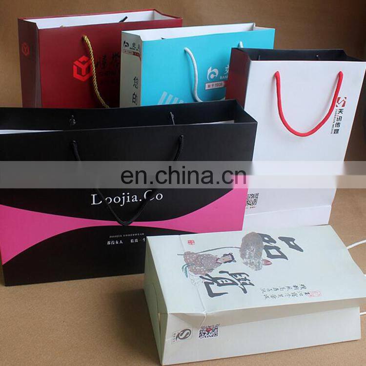 Top quality popular eco friendly folding packing paper bag with handles wholesale