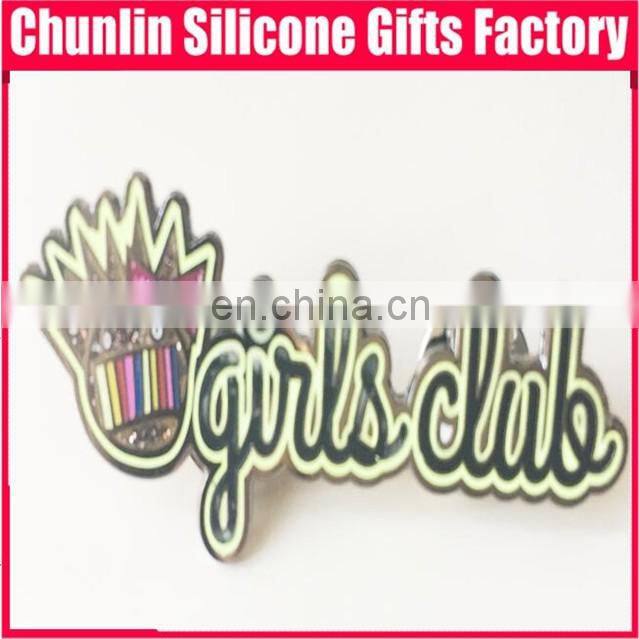 carved lapel pin with resin