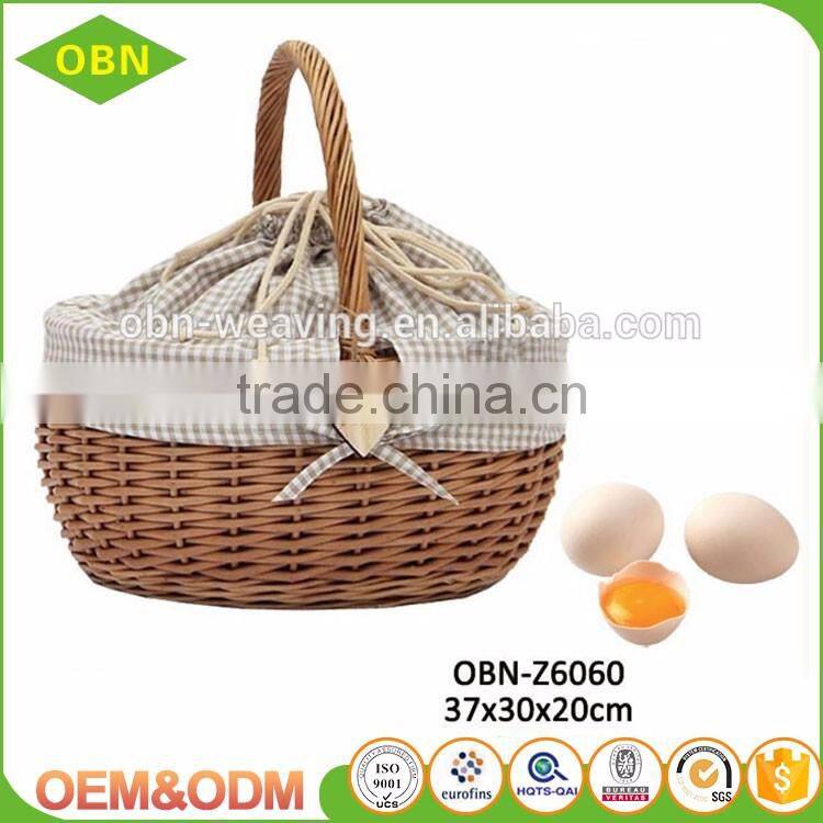 China wholesale customized handmade 100% natural antique wicker egg basket with fabric cover