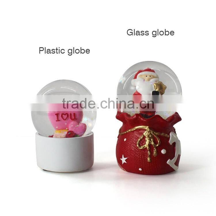 Small custom plastic snow globe