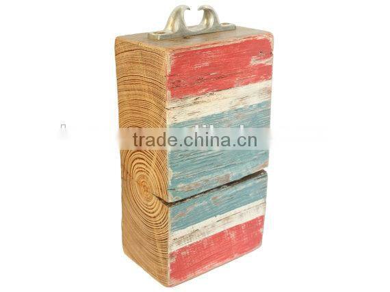 older aged wooden door stop