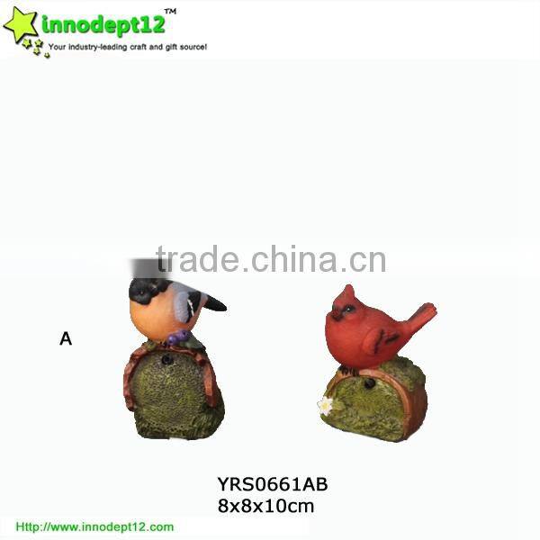 set 2 garden decoration solar power bird caller with shadow control, and resin stone with flowers