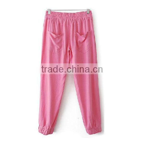 two hip pocket pink color girl's three-quarter pants with smocked drawstring waist