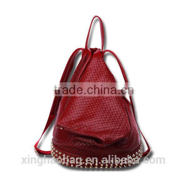 Hot selling fashionable triangle shaped leather backpack with rivet