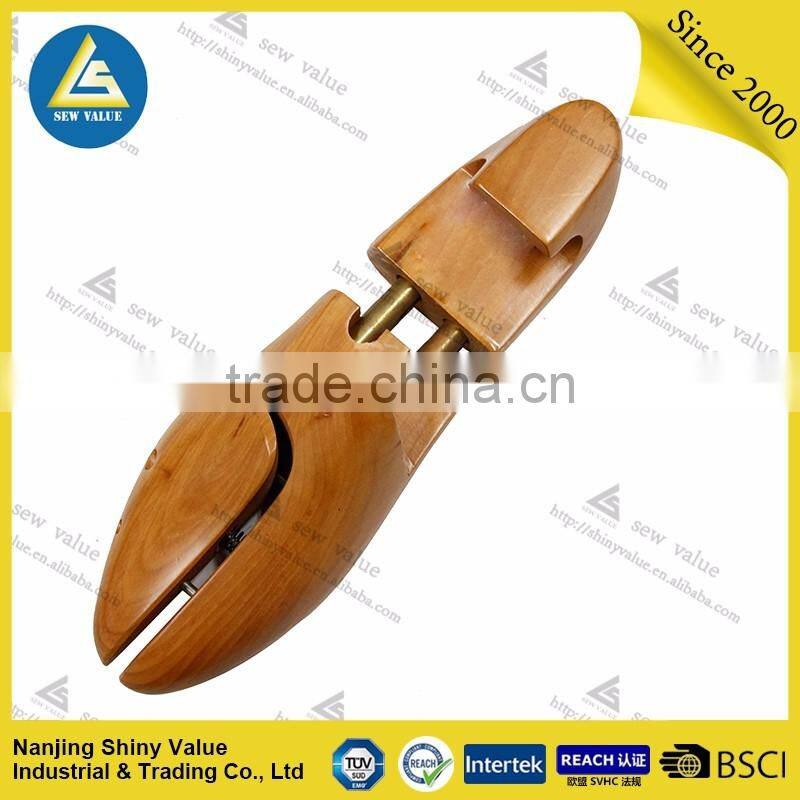 Painted type wooden shoe tree in lotus wood and thin wax on the surface with double tube